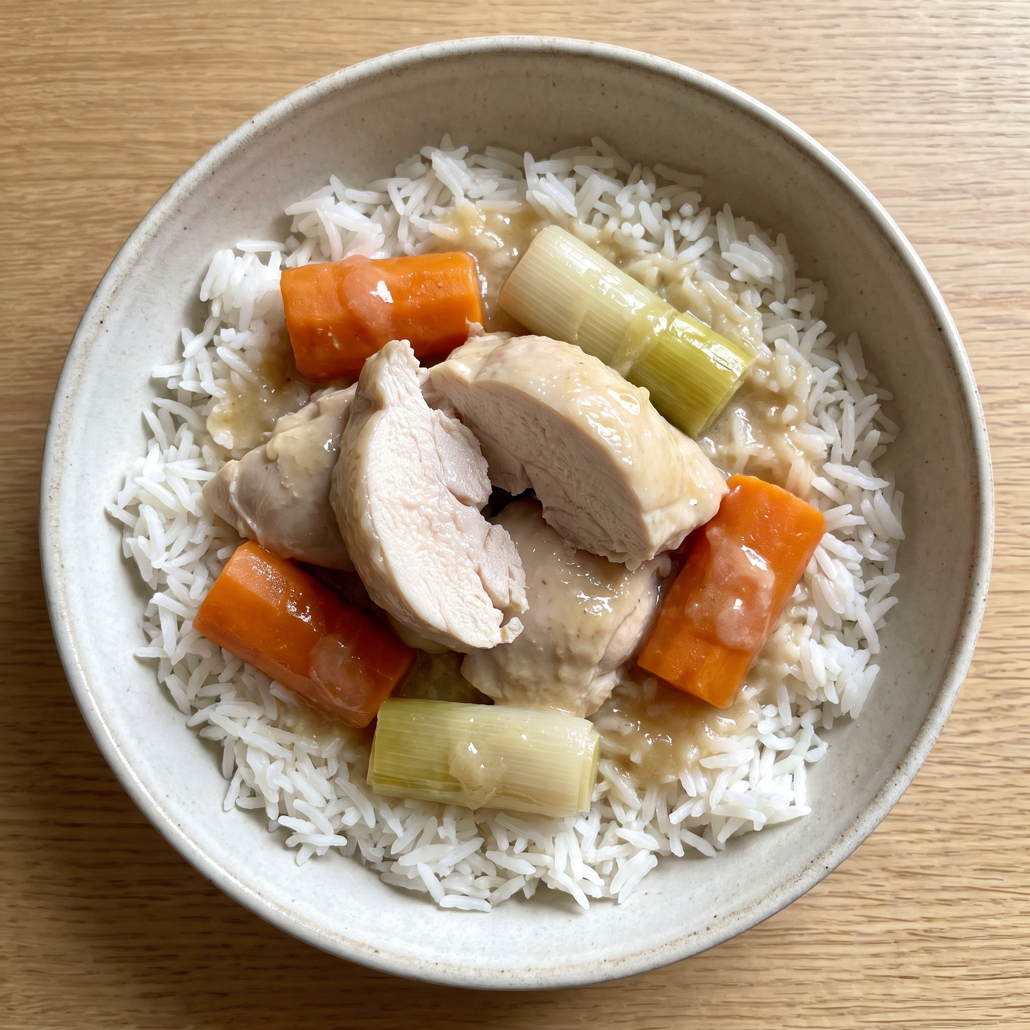 Poule au riz – Reis aus aromatischem Kochsud